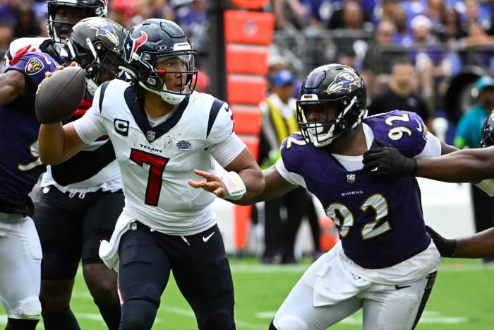 Texans quarterback C.J. Stroud attempts a pass as Baltimore Ravens defensive tackle Rayshad Nichols rushes during the second half at M&T Bank Stadium.